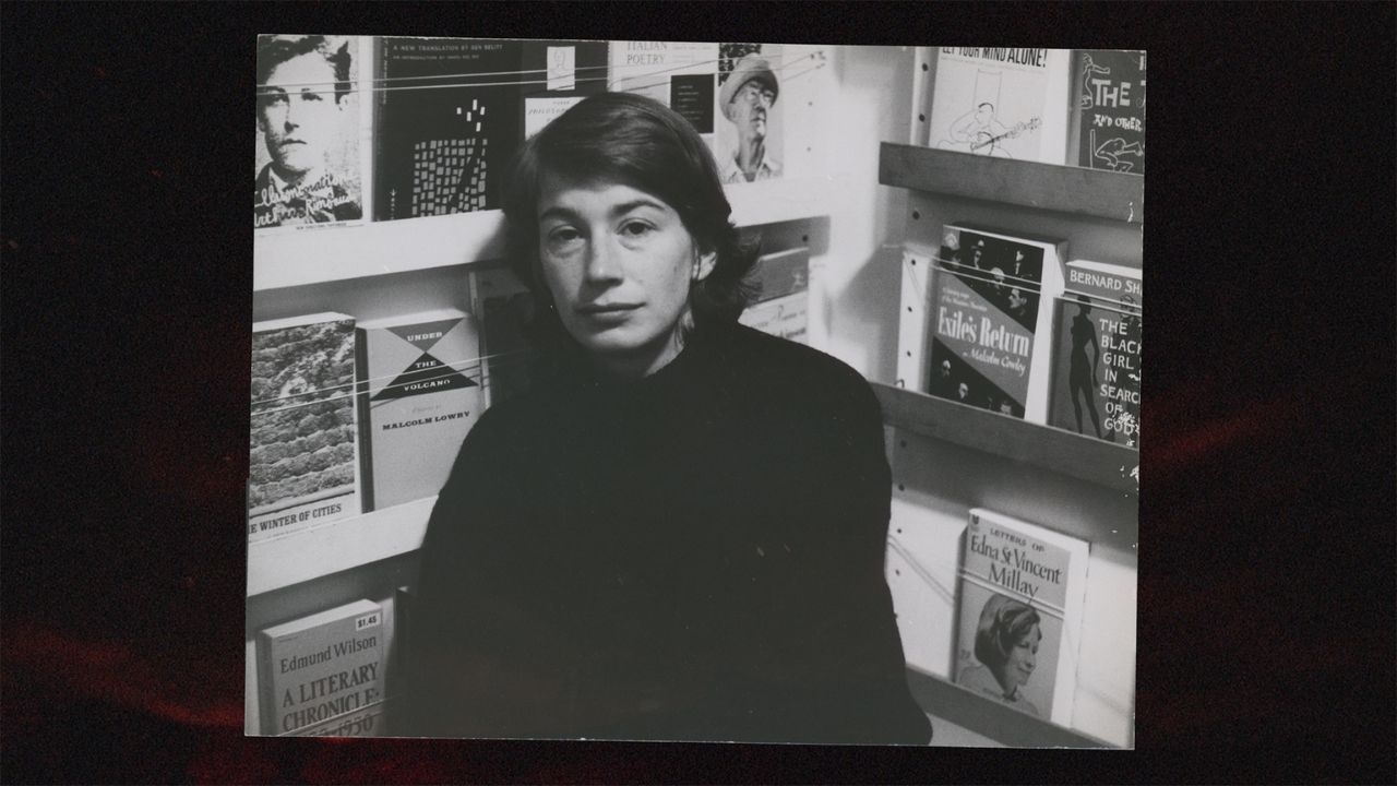 vintage photo of a woman at a book store